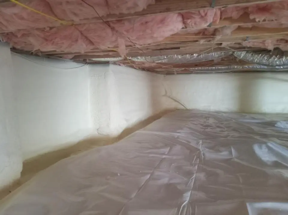 Crawl space encapsulation with closed-cell spray foam for Commercial Roof Restoration in Coal